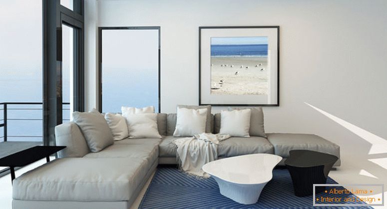 Moderna dnevna soba s dnevnim boravkom s svijetlim prozračnim dnevnim boravkom s udobnim suvremenim tapeciranim sivim apartmanom, umjetnošću na zidu i velikim panoramskim prozorom uz jedan zid s pogledom na ocean