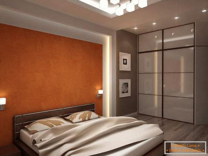 Funkcionalna spavaća soba s dobro odabranom rasvjetom izrađena je u sivim i svijetlim bež tonovima. 