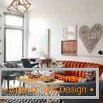 Narančasta kauč i sive naslonjače