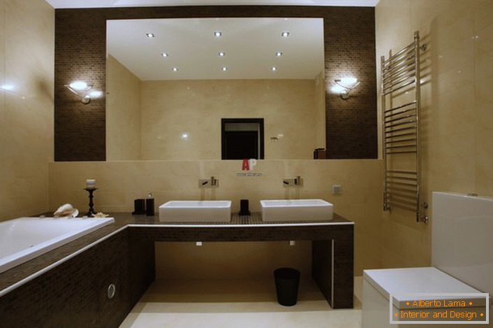 Kupaonica u minimalističkom stilu uređena je u svijetlim bež i smeđim tonovima. 
