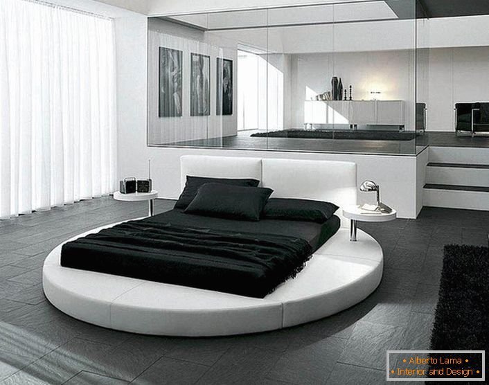 Dizajn spavaće sobe u stilu minimalizma naglašen je pravilno odabranim namještajem. Zanimljiv detalj interijera je okrugli krevet.