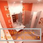 Dizajn uske kupaonice u narančastim tonovima