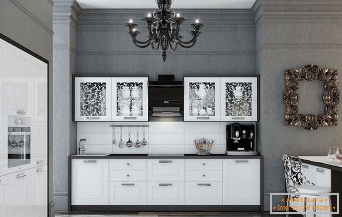 Kuhinja je napravljena u povoljnoj kombinaciji kontrastnih bijelih i crnih boja. Sjajne površine graciozno se uklapaju u unutrašnjost u neoklasičnom stilu.