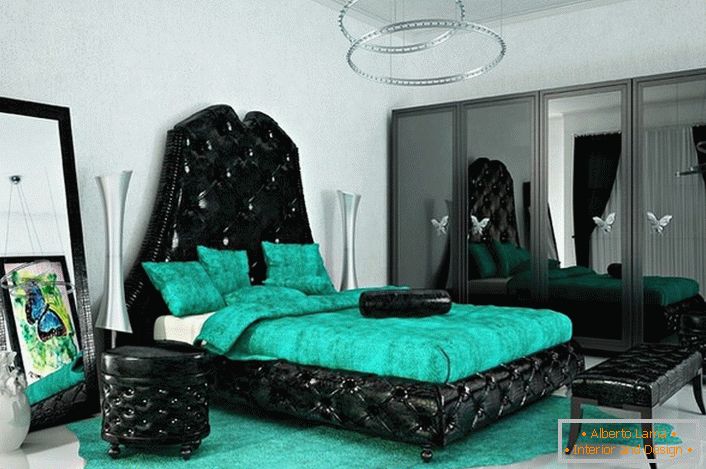 Svijetle, privlačne boje za stil umjetnosti. Smaragdna boja harmonizira se s crnom bojom. Idealna soba za kreativnu osobu.